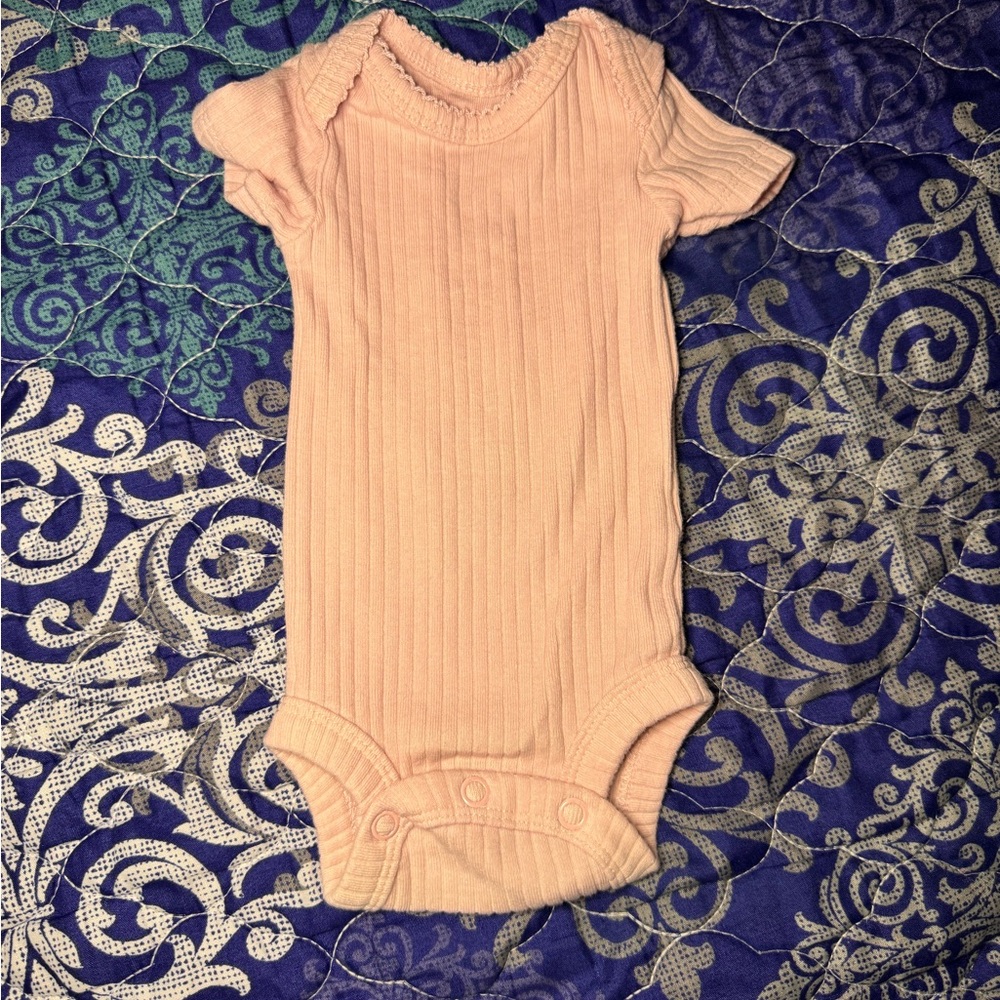 Peach Ribbed Baby Onesie